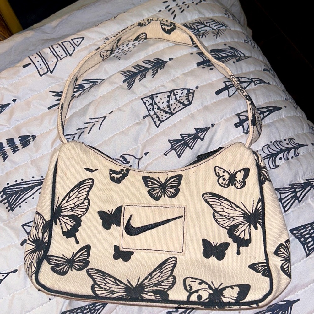 Super adorable Nike butterfly purse ! Like new